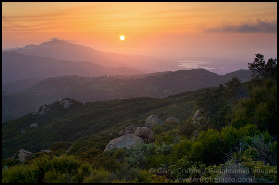 Photo: Sunset over Santa Ynez Peak, and the distant Lake Cachuma, from the Santa Ynez Mountains, near Santa Barbara, California